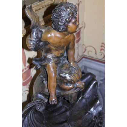  Fontaine "Enfant au dauphin" en bronze sur  Moinat SA  - Antiquités décoration