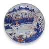  Assiette en porcelaine (cheveux) sur  Moinat SA  - Antiquités décoration