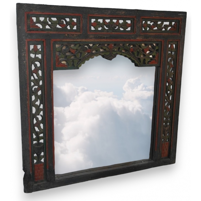  Miroir indonésien en bois sculpté sur  Moinat SA  - Antiquités décoration