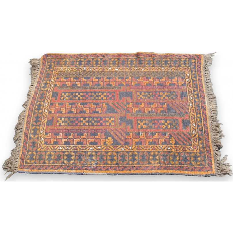 Small, worn rug from Moinat SA – Antiques and home décor