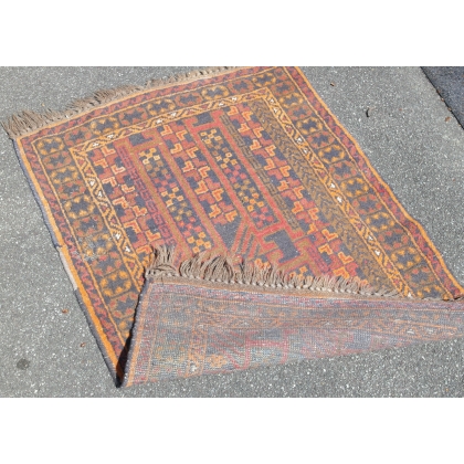 Small, worn rug from Moinat SA – Antiques and home décor