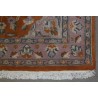  Tapis pakistanais orange et rose sur  Moinat SA  - Antiquités décoration