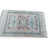 Persian rug with a pink background at  Moinat SA  - Antiques and home décor