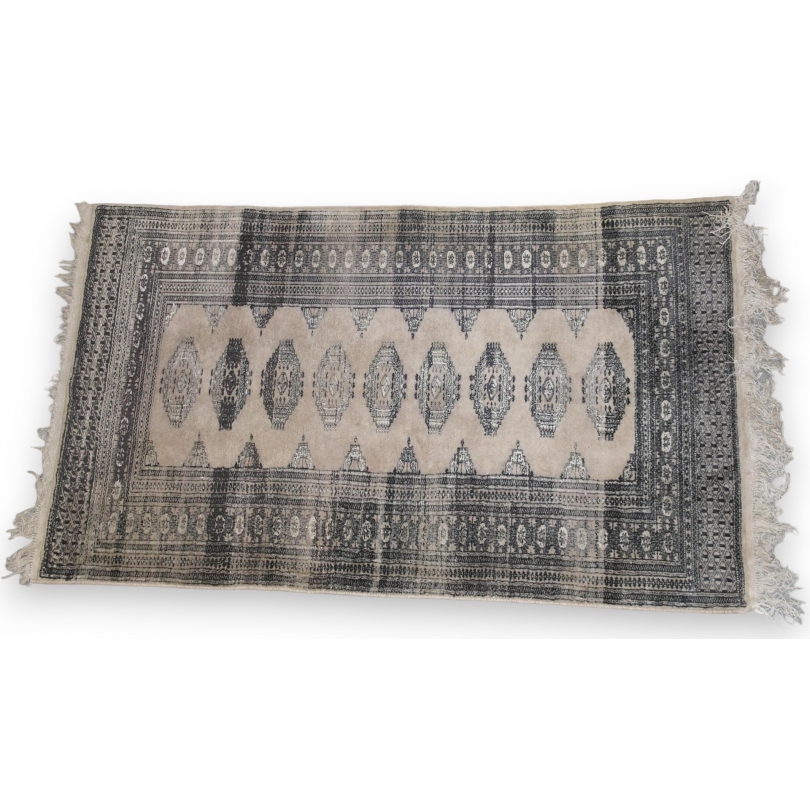  Tapis fond beige et décor gris sur  Moinat SA  - Antiquités décoration