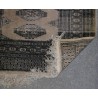  Tapis fond beige et décor gris sur  Moinat SA  - Antiquités décoration