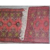  Tapis fond rouge sur  Moinat SA  - Antiquités décoration
