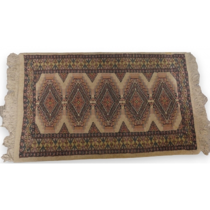  Tapis décor bleu sur fond beige sur  Moinat SA  - Antiquités décoration