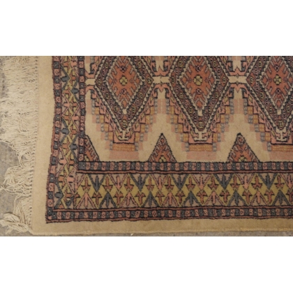  Tapis décor bleu sur fond beige sur  Moinat SA  - Antiquités décoration