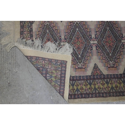  Tapis décor bleu sur fond beige sur  Moinat SA  - Antiquités décoration