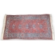 Tapis fond rouge