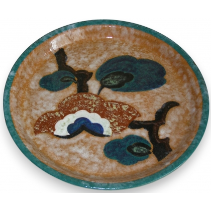 Plat rond, en céramique, signé BOAS