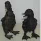 Pair of ducklings in bronze