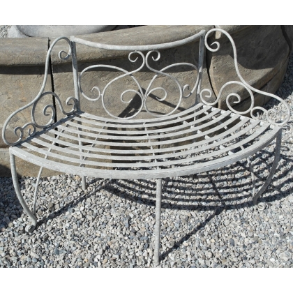  Banc d'arbre en quatre éléments en fer sur  Moinat SA  - Antiquités décoration