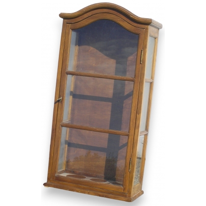 Vitrine à pendules, en noyer avec 1 porte