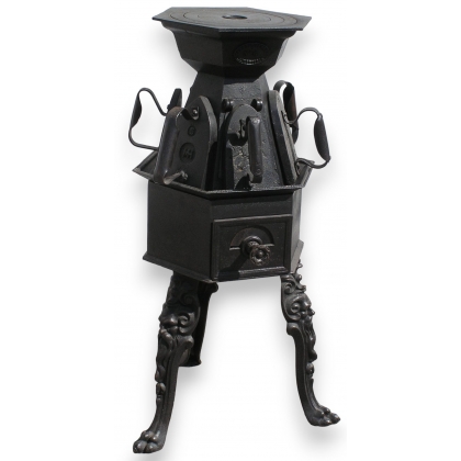 Iron-lined stove or ironing stove by Moinat SA – Antiques and home décor