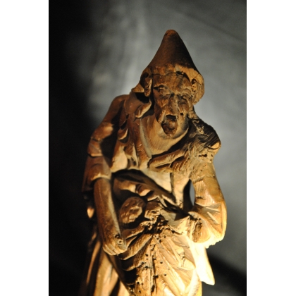  Statuette "Le colporteur" en bois sur  Moinat SA  - Antiquités décoration