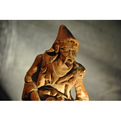  Statuette "Le colporteur" en bois sur  Moinat SA  - Antiquités décoration