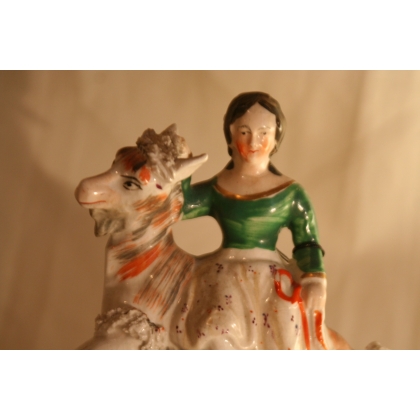 Earthenware figurine of a little girl with a goat by Moinat SA – Antiques and home décor