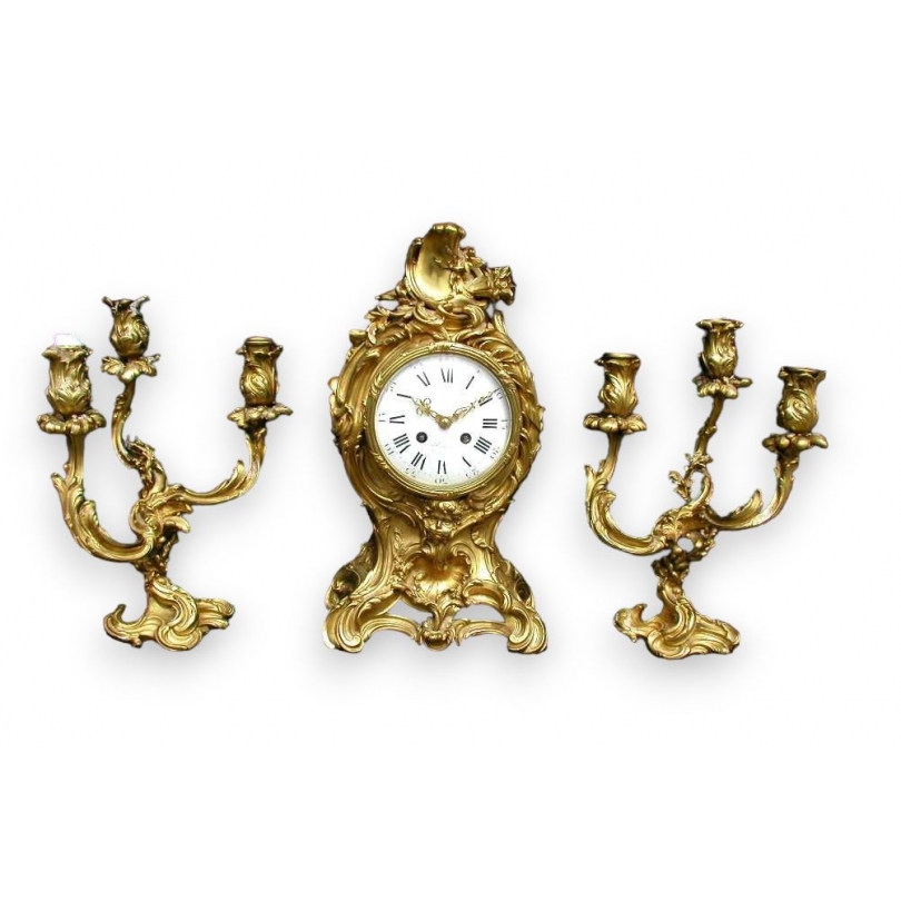  Pendule et paire de chandeliers, COLLIN. sur  Moinat SA  - Antiquités décoration