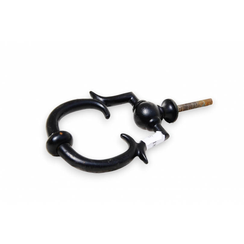Black cast-iron door knocker at  Moinat SA  - Antiques and home décor