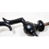 Black cast-iron door knocker at  Moinat SA  - Antiques and home décor