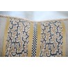 Cushion edged with Aleppo-patterned fabric at Moinat SA – Antiques and home décor