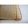 Cushion edged with Aleppo-patterned fabric at Moinat SA – Antiques and home décor