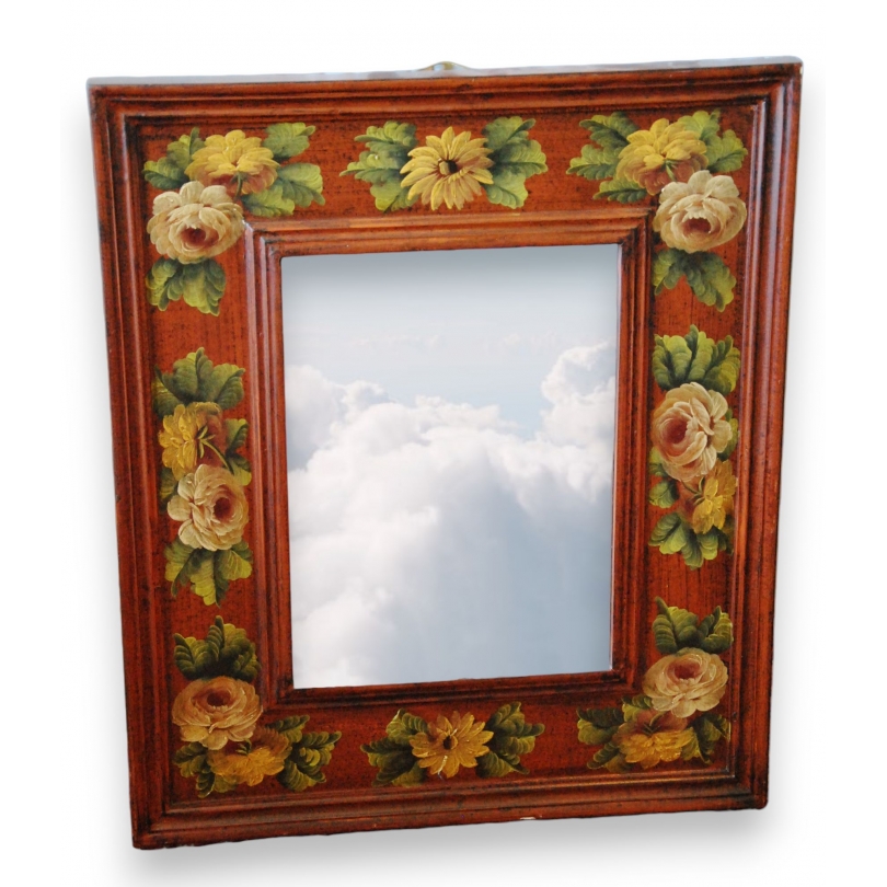  Miroir en bois laqué à motifs floraux sur  Moinat SA  - Antiquités décoration