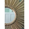  Miroir soleil en résine moulée dorée sur  Moinat SA  - Antiquités décoration