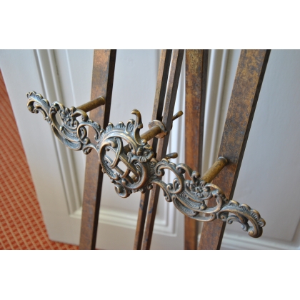 Giant brass scroll-work easel at  Moinat SA  - Antiques and home décor