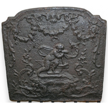  Plaque de cheminée en fonte "Chérubin sur  Moinat SA  - Antiquités décoration