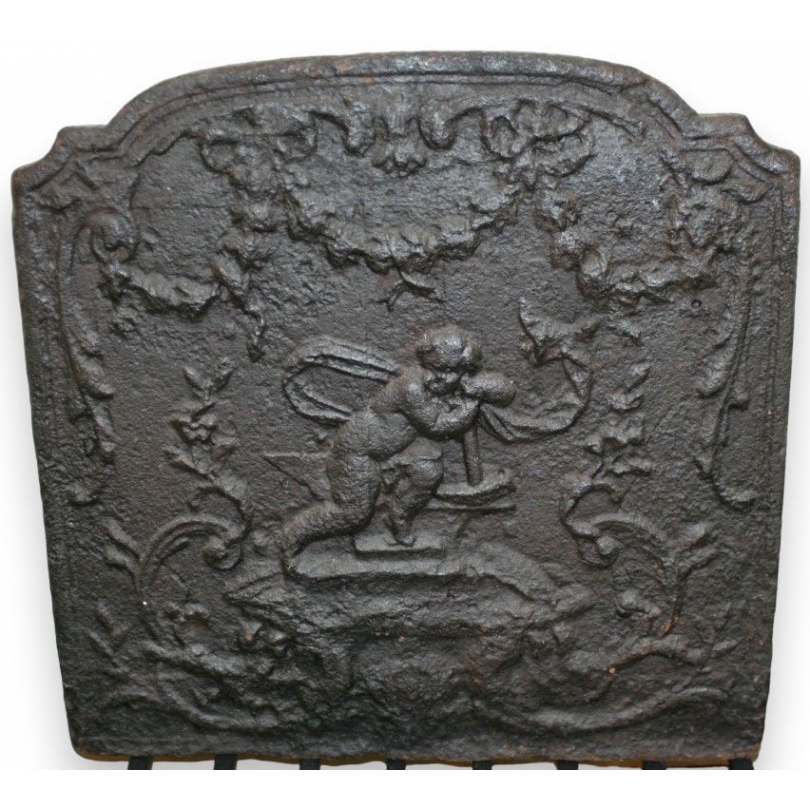  Plaque de cheminée en fonte "Chérubin sur  Moinat SA  - Antiquités décoration