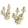 Pair of Louis XV-style candlesticks. Available from  Moinat SA  - Antiques and home décor