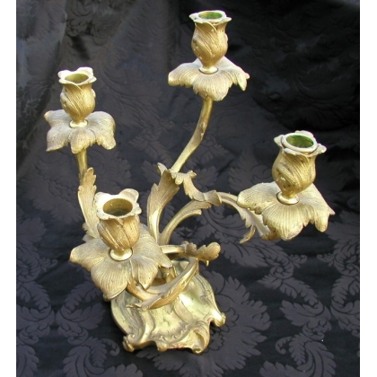 Pair of Louis XV-style candlesticks. Available from  Moinat SA  - Antiques and home décor