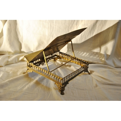 "IHS" bookend, in openwork brass, from  Moinat SA  - Antiques and home décor