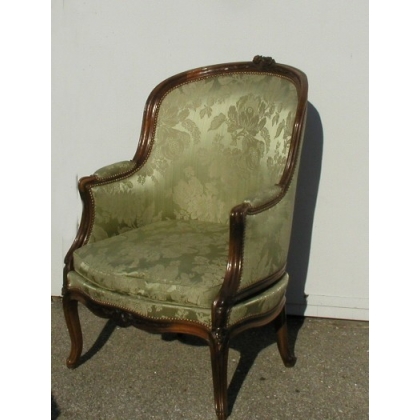 A pair of Louis XV wing chairs with one footrest. From  Moinat SA  - Antiques and home décor