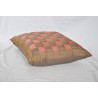 Brown and pink chequered cushion at  Moinat SA  - Antiques and home décor