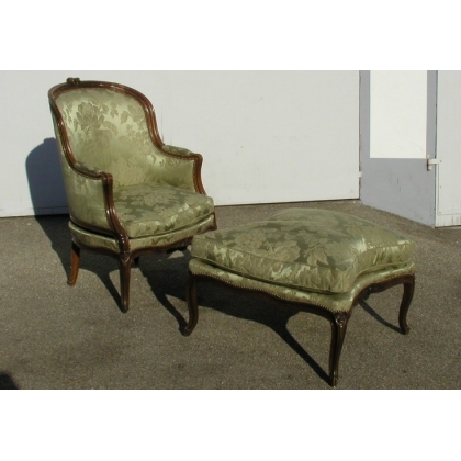 A pair of Louis XV wing chairs with one footrest. From  Moinat SA  - Antiques and home décor
