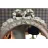  Miroir ovale style Louis XVI en bois sur  Moinat SA  - Antiquités décoration