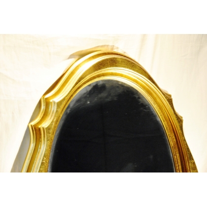  Miroir ovale biseauté en bois doré sur  Moinat SA  - Antiquités décoration