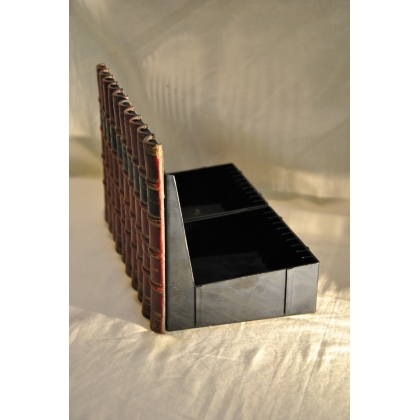 Red faux-book CD holder at  Moinat SA  - Antiques and home décor