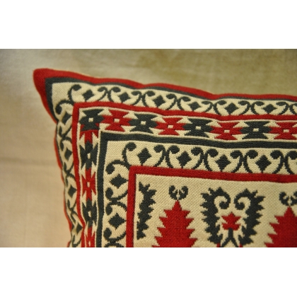 Red and green ‘hearts and fir trees’ cushion at Moinat SA – Antiques and home décor