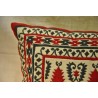Red and green ‘hearts and fir trees’ cushion at Moinat SA – Antiques and home décor