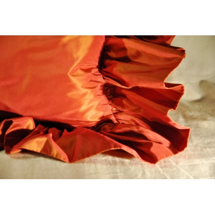 Red silk cushion with a frill at  Moinat SA  - Antiques and home décor