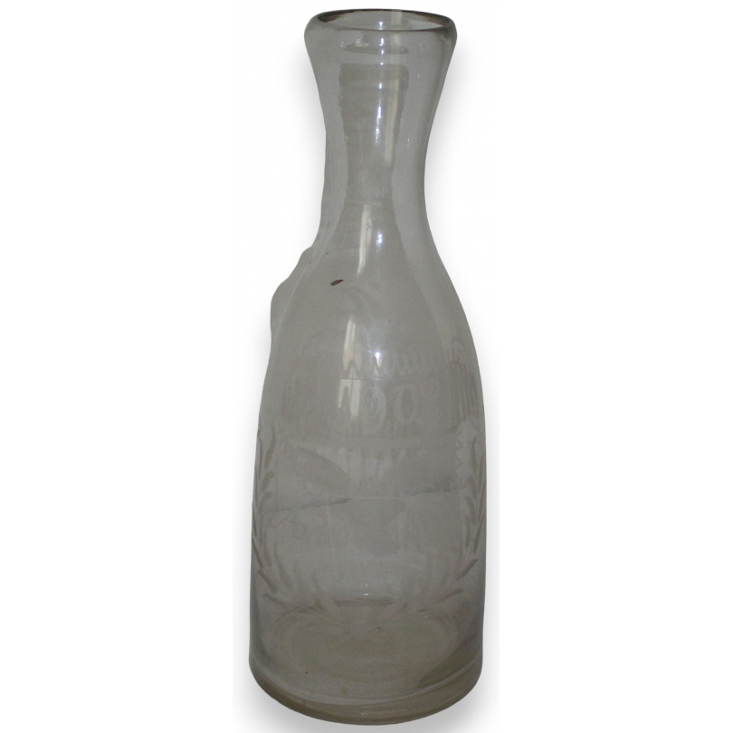 Bottle dated 1902, made of blown glass. From  Moinat SA  - Antiques and Decor
