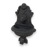  Fontaine murale "Lion" en fonte noire sur  Moinat SA  - Antiquités décoration