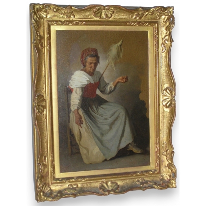 Tableau \"Femme filant\", monogrammé V.M.
