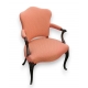 Fauteuil anglais recouvert avec tissu orange.