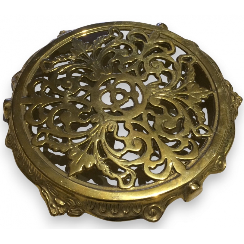 Round polished brass trivet from  Moinat SA  - Antiques and home décor