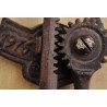 Wall-mounted corkscrew made of cast iron and wood at  Moinat SA  - Antiques and home décor